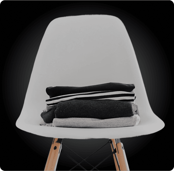 Modern chair with stacked clothes